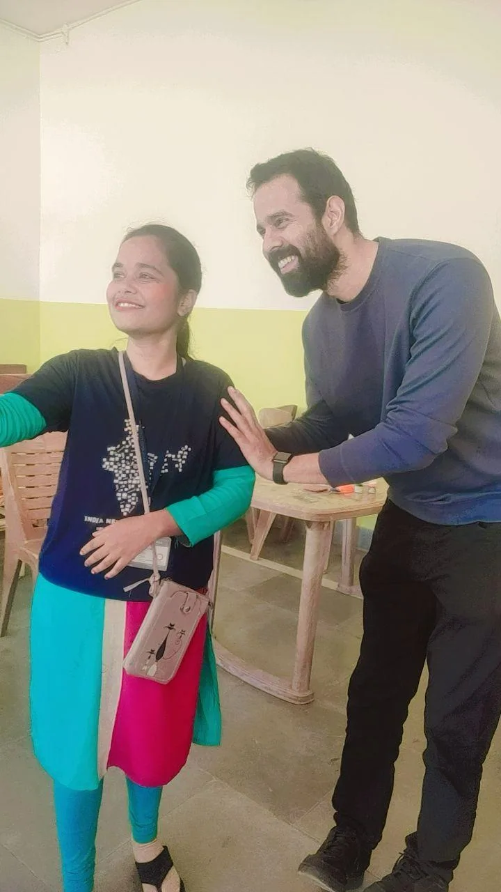 Bhunesh Sharma posing for a selfie with an event attendee