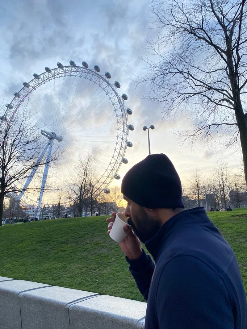 Bhunesh Sharma enjoying a drink near the London Eye